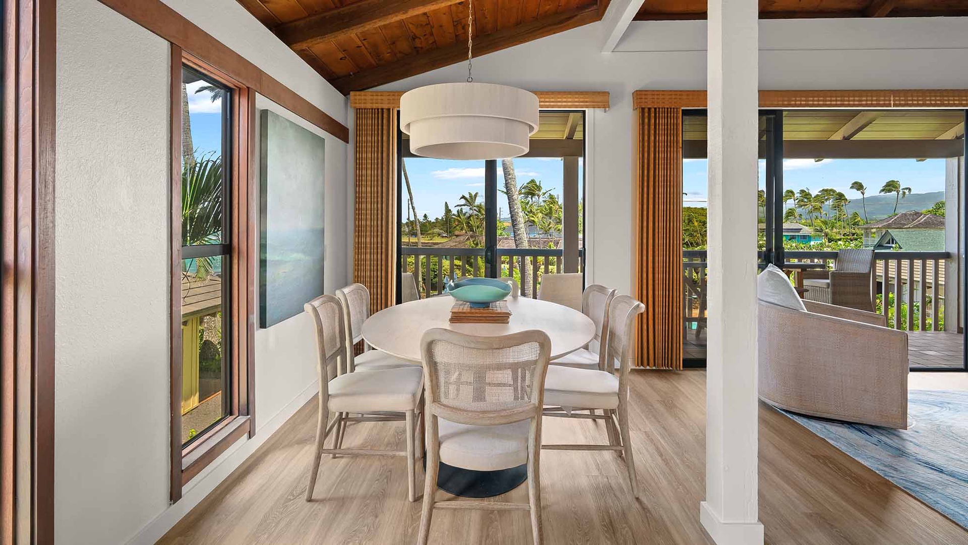 Gather around this welcoming dining table where every meal becomes a celebration, framed by tropical breezes and peaceful views that make your Hawaiian escape feel like home.