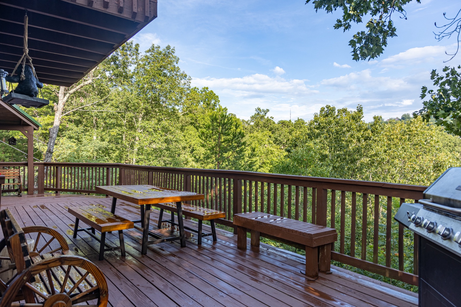 Deck dining area with a gas grill at Bearing Views, a 3 bedroom cabin rental located in Pigeon Forge