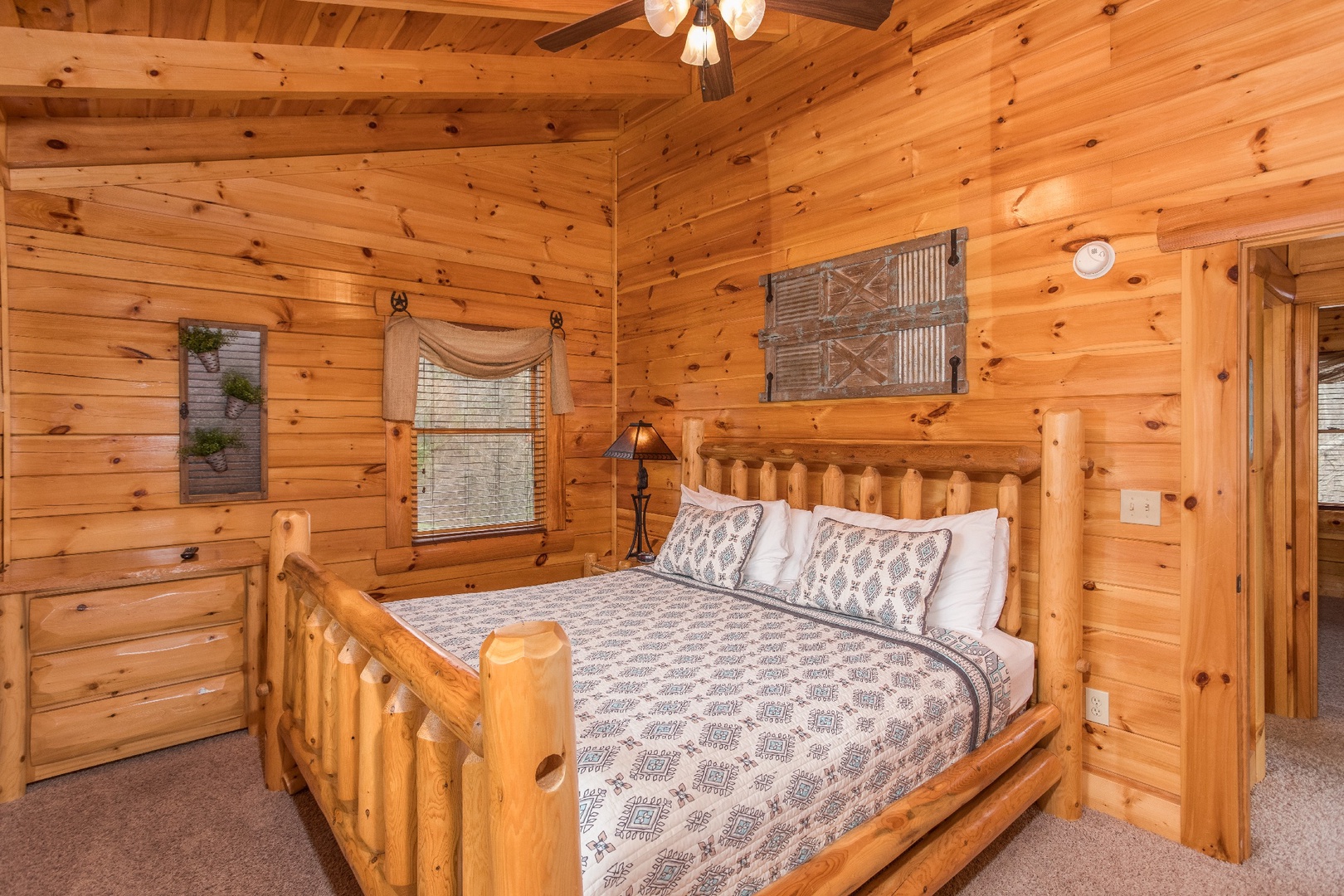 Loft bedroom with a king bed at Mountain View Meadows, a 3 bedroom cabin rental located in Pigeon Forge