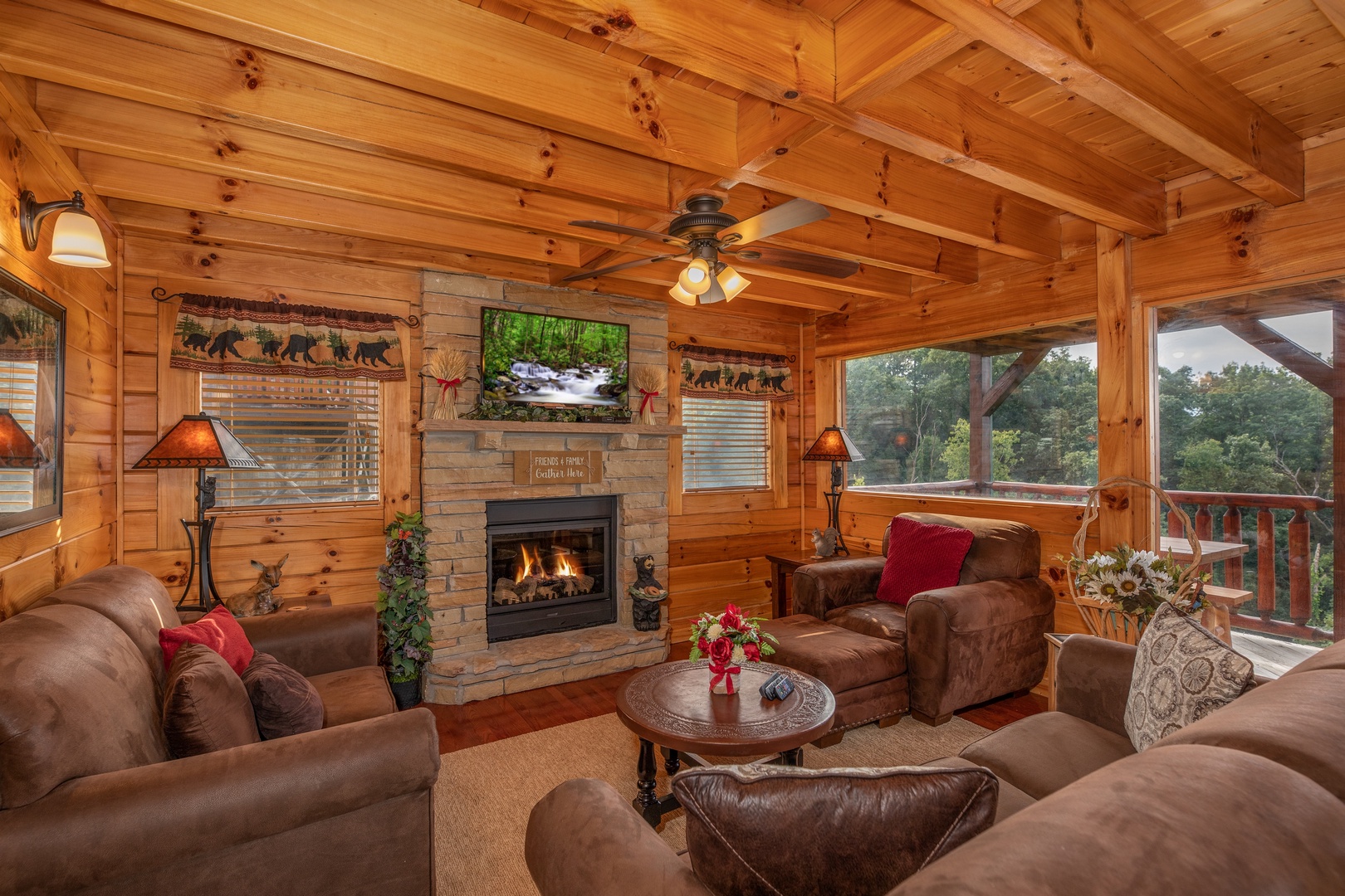 Fireplace and TV in the living room at 1 Above the Smokies, a 2 bedroom cabin rental located in Pigeon Forge