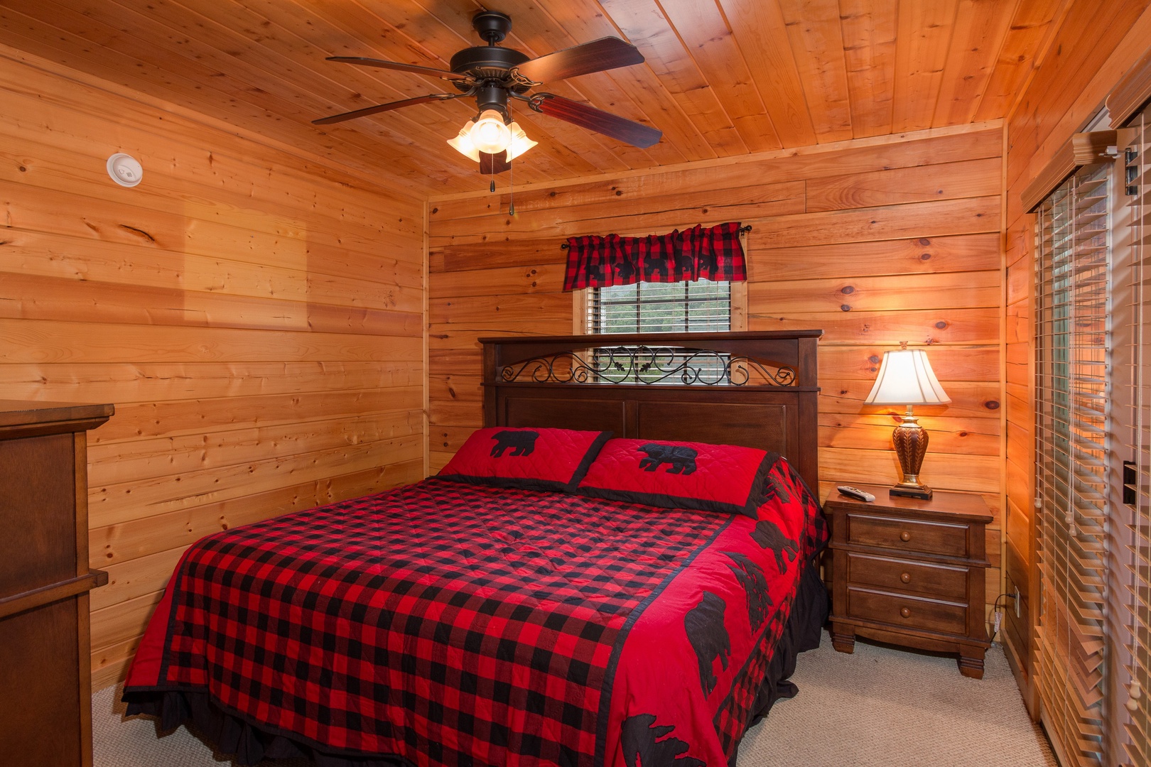 Bedroom at Family Ties Lodge, a 4 bedroom cabin rental located in pigeon forge
