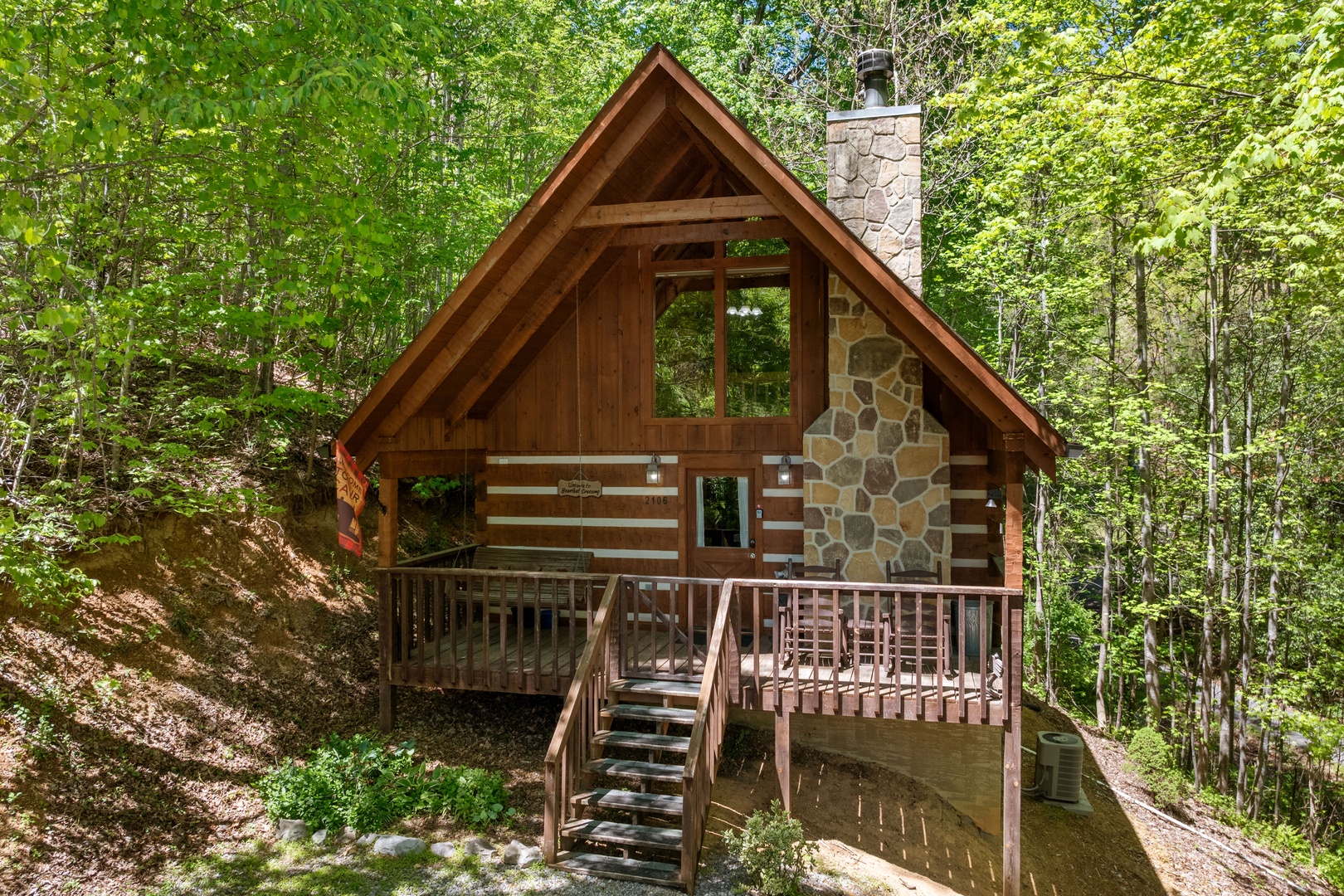 Exterior view of the entry from the parking area at Bearfoot Crossing, a 1-bedroom cabin rental located in Pigeon Forge