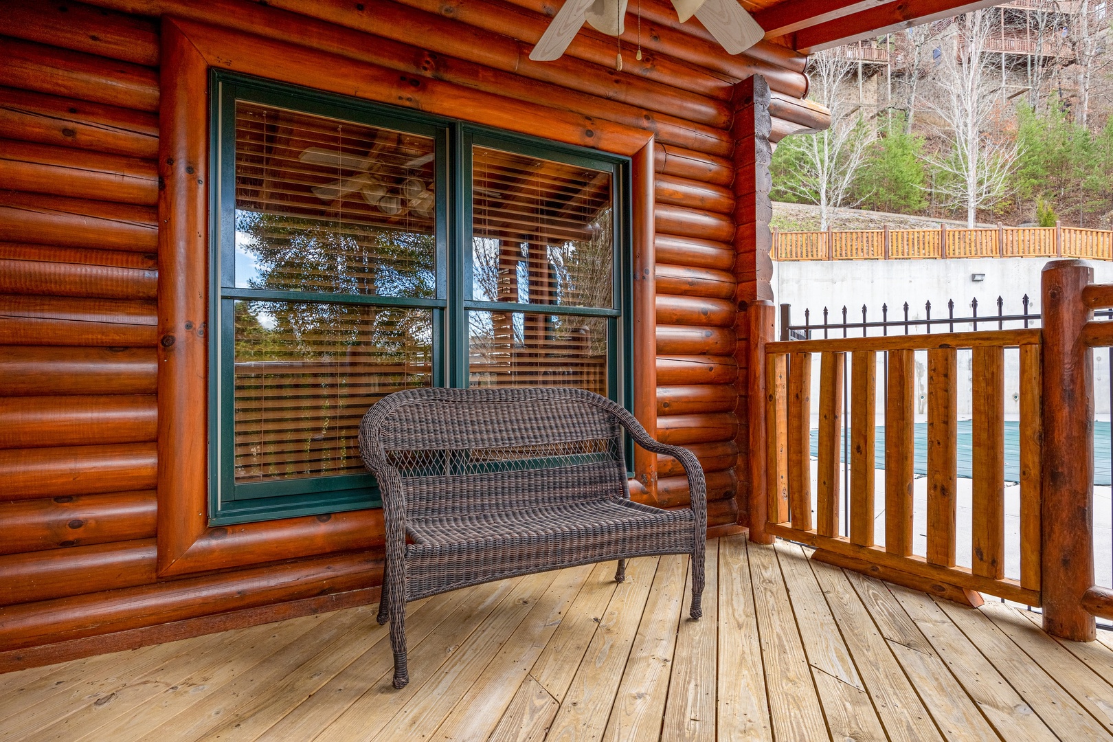 Wicker Loveseat on Covered Deck at Poolhouse Lodge