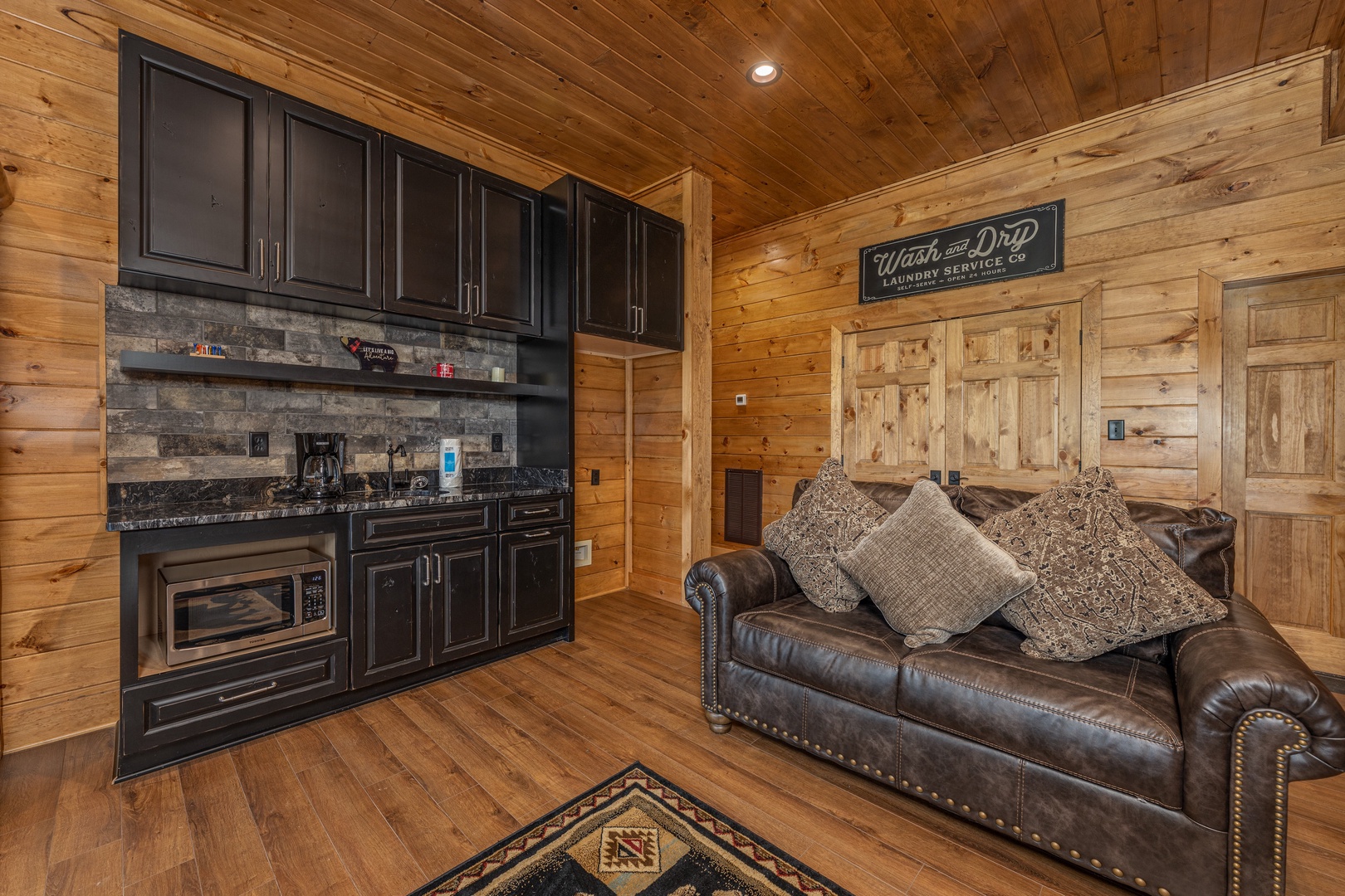 Kitchenette in the lower living room at Black Bears & Biscuits Lodge, a 6 bedroom cabin rental located in Pigeon Forge