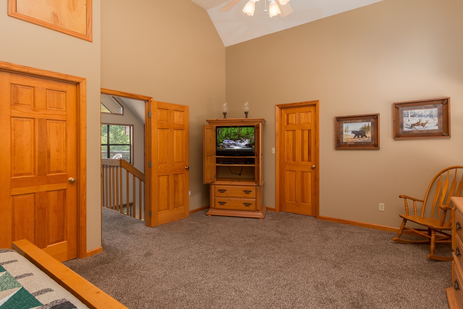 TV in the bedroom at Stones Throw, a 4 bedroom cabin rental located in Pigeon Forge