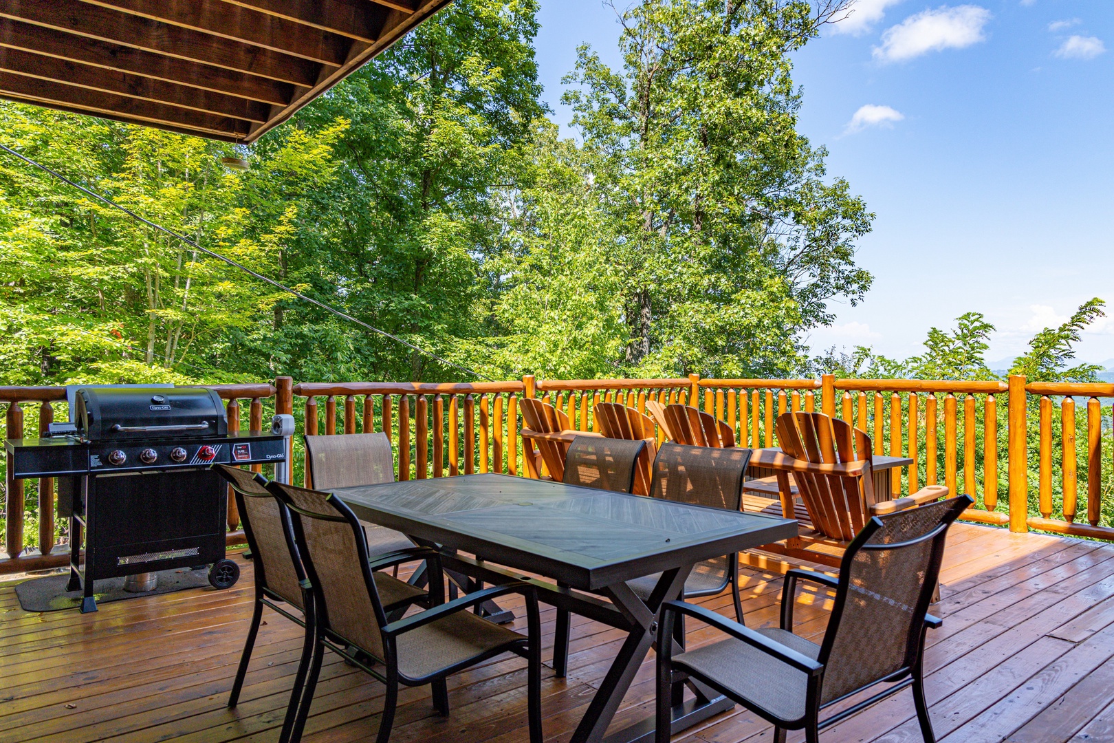 Outdoor grill and dining for 6 at Sky View, A 4 bedroom cabin rental in Pigeon Forge
