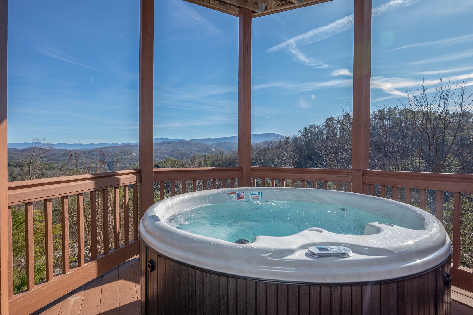 Hot Tub on covered deck at Mountain Mama, a 3 bedroom cabin rental located in pigeon forge