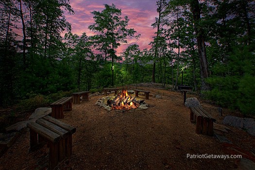 Fire pit and grill at Majestic Views, a 3 bedroom cabin rental located in Pigeon Forge
