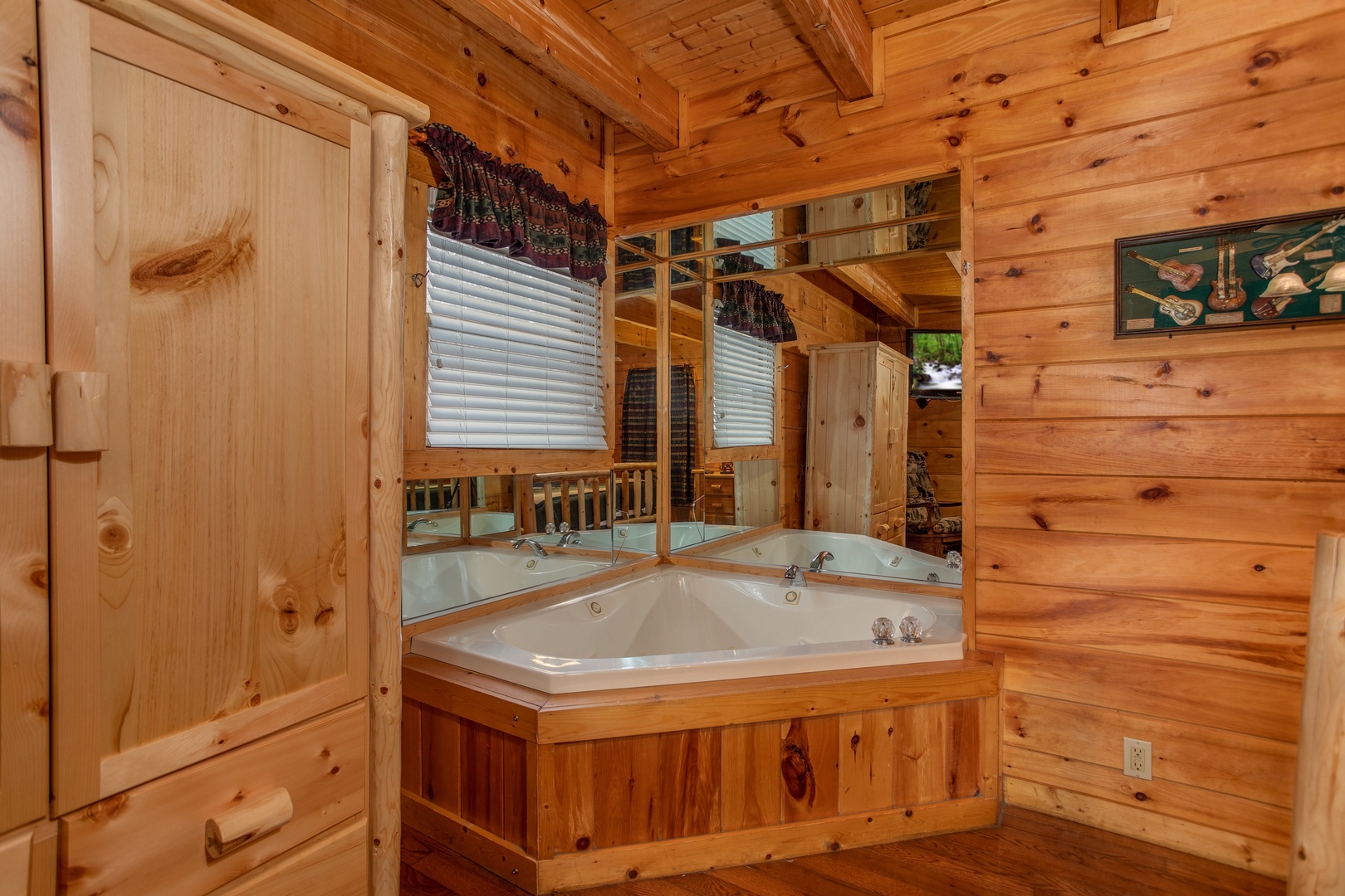 Jacuzzi in a bedroom at Mountain Music, a 5 bedroom cabin rental located in Pigeon Forge