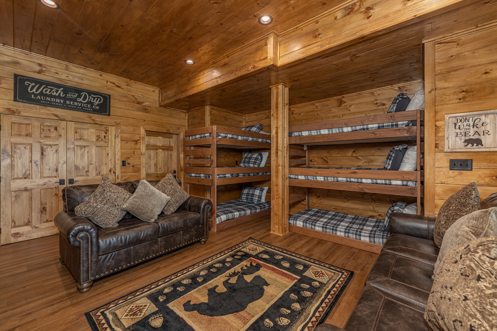 Bunks in the lower level at Black Bears & Biscuits Lodge, a 6 bedroom cabin rental located in Pigeon Forge