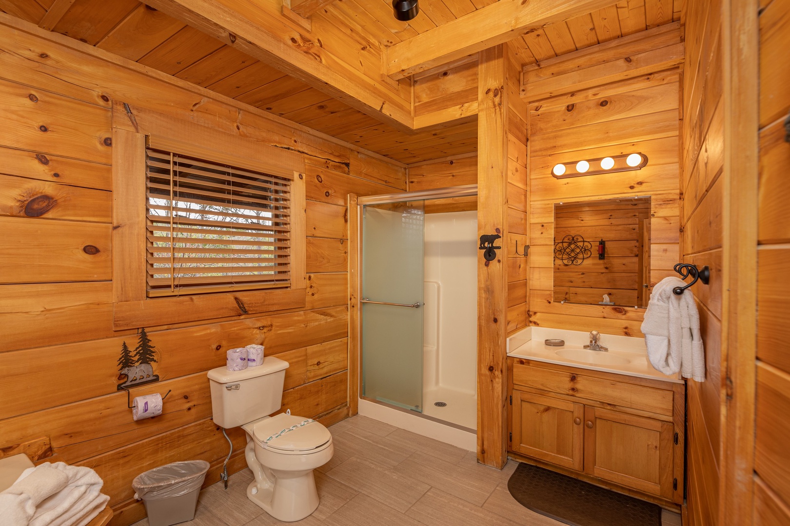 Bathroom with a shower at Livin' Simple, a 2 bedroom cabin rental located in Pigeon Forge
