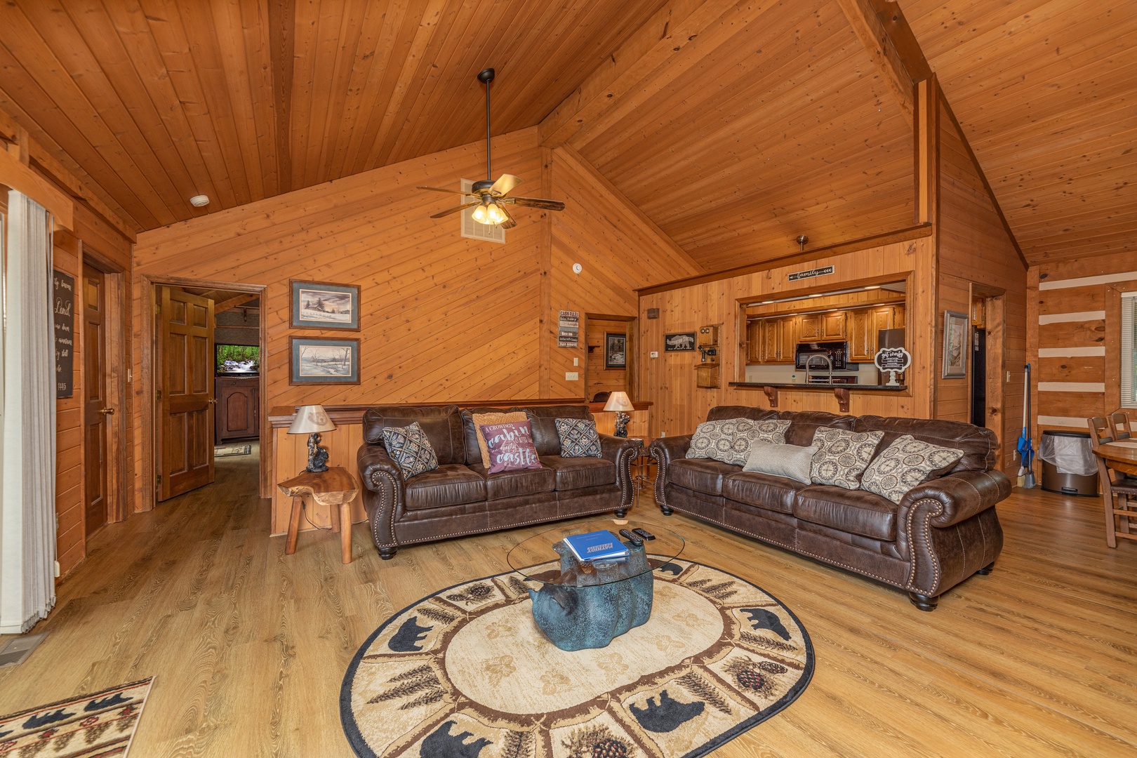 Two sofas in a living room at Cubs' Crib, a 3 bedroom cabin rental located in Gatlinburg