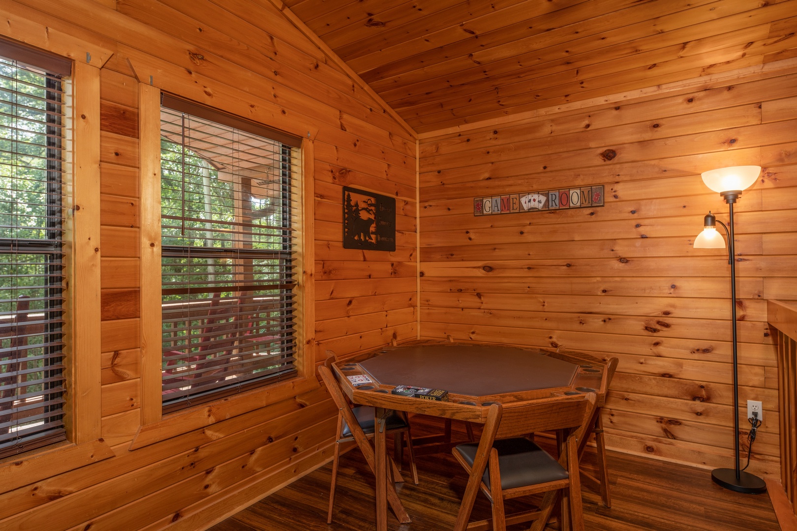 Card table at Hawk's Heart Lodge, a 3 bedroom cabin rental located in Pigeon Forge