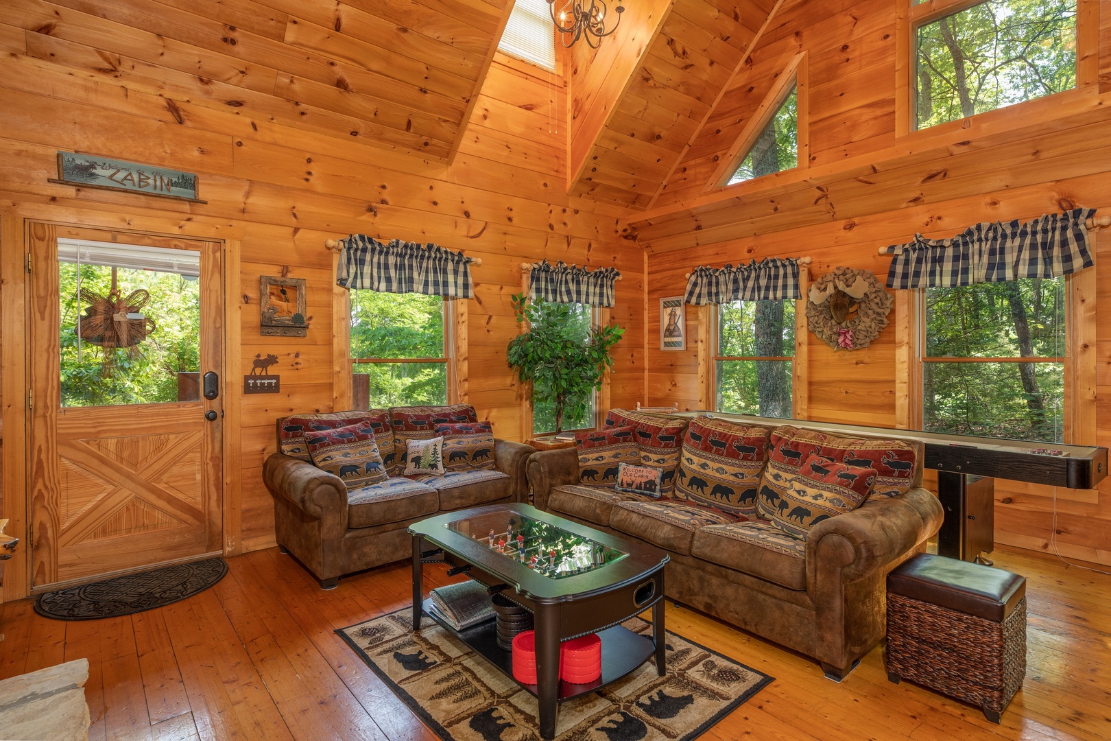 Sofa and loveseat in the living room at Misty Mountain Escape, a 2 bedroom cabin rental located in Gatlinburg