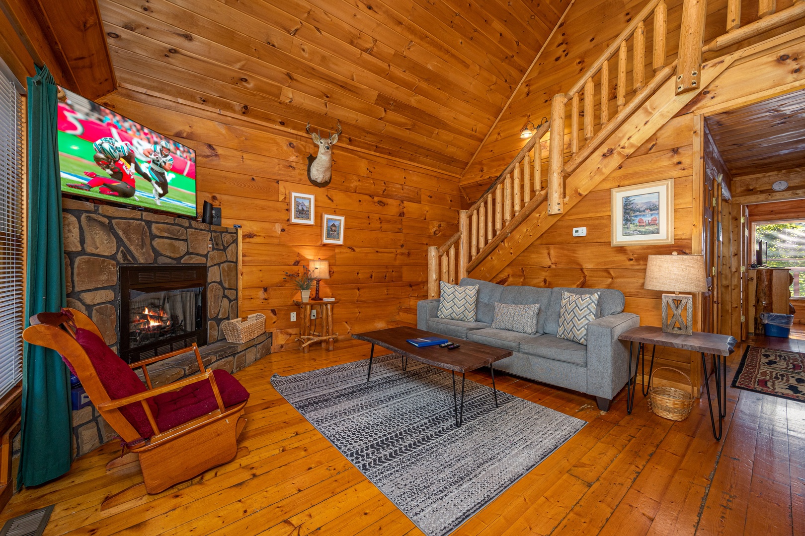 Living room seating at American Dream, a 2 bedroom cabin rental located in Gatlinburg
