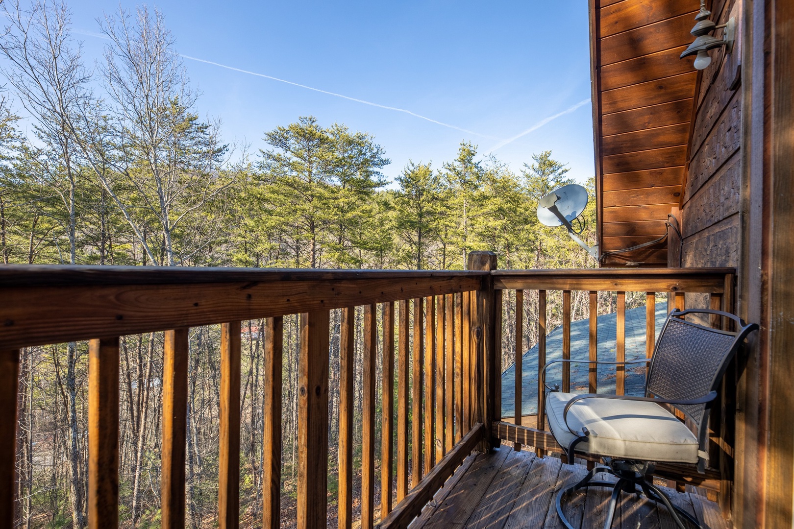 Deck chair at King of the Mountain, a 3 bedroom cabin rental located in Pigeon Forge