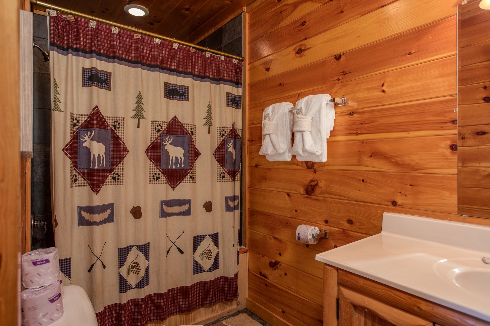 Bathroom with a tub and shower at 5 Star View, a 3 bedroom cabin rental located in Gatlinburg