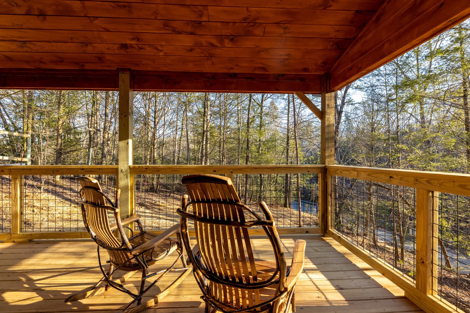 Wooded porch views at Bessy Bears Cabin, a 2 bedroom cabin rental located inGatlinburg