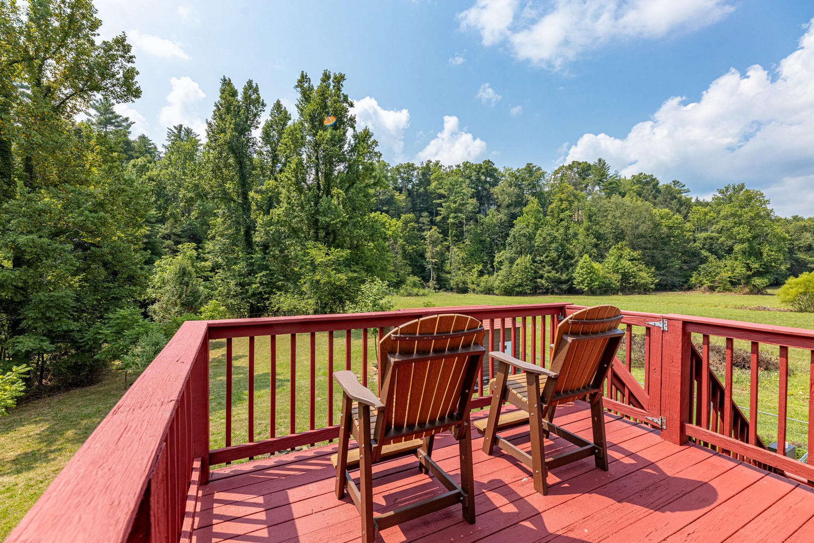 Deck seating for 2 at 1 Crazy Cub, a 4 bedroom cabin rental located in Pigeon Forge
