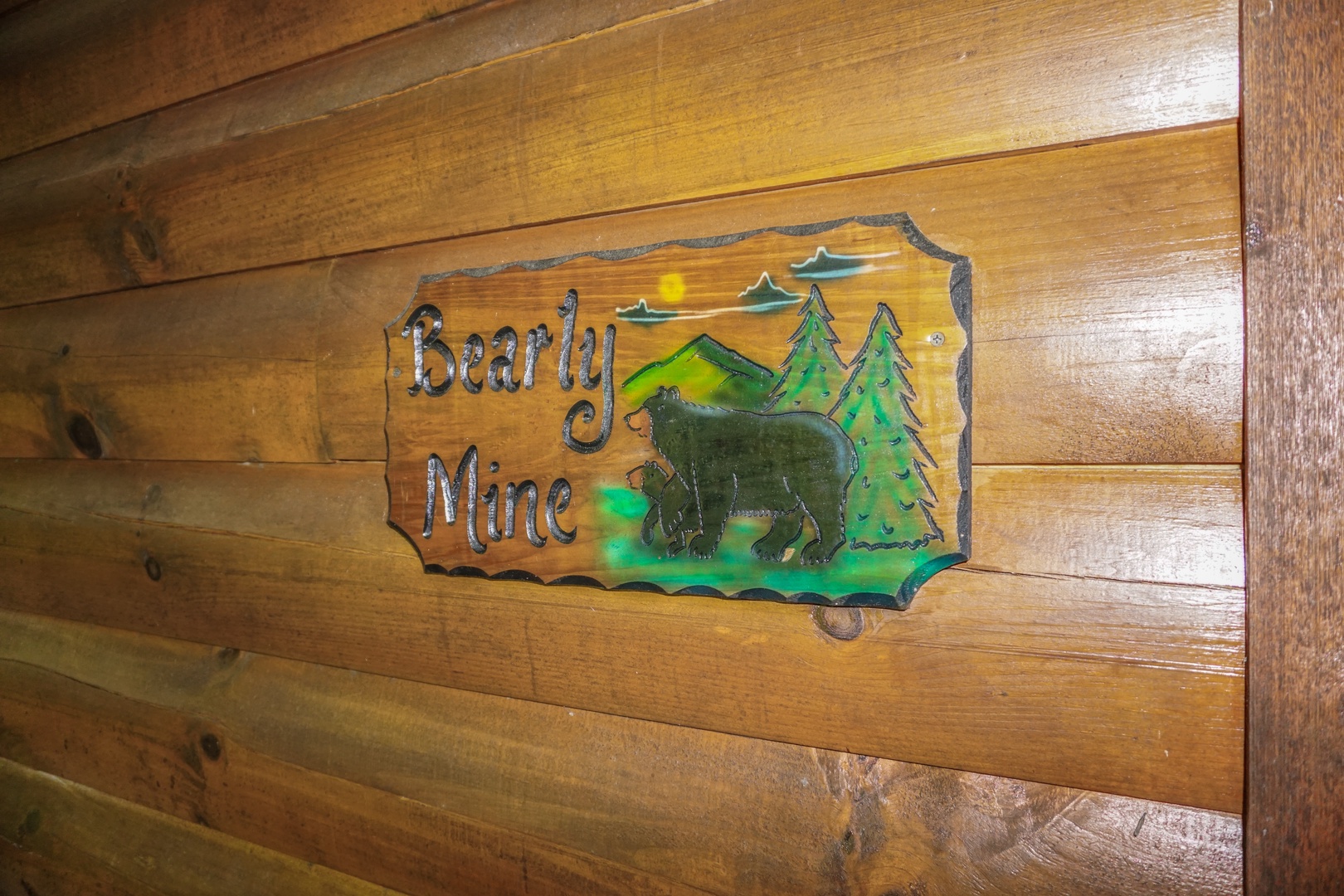 Custom welcome sign at Bearly Mine, a 1-bedroom cabin rental in Pigeon Forge