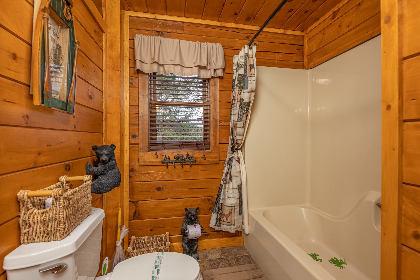 Tub and shower at Pigeon Forge Pleasures, a 3 bedroom cabin rental located in Pigeon Forge