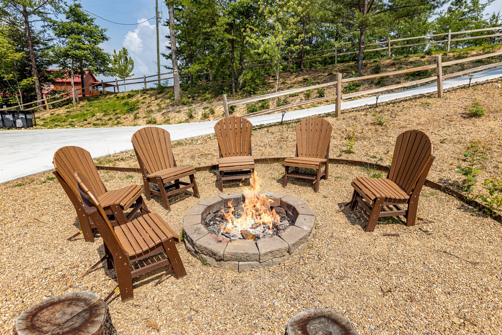 Firepit seating at J's Hideaway, a 4 bedroom cabin rental located in Pigeon Forge
