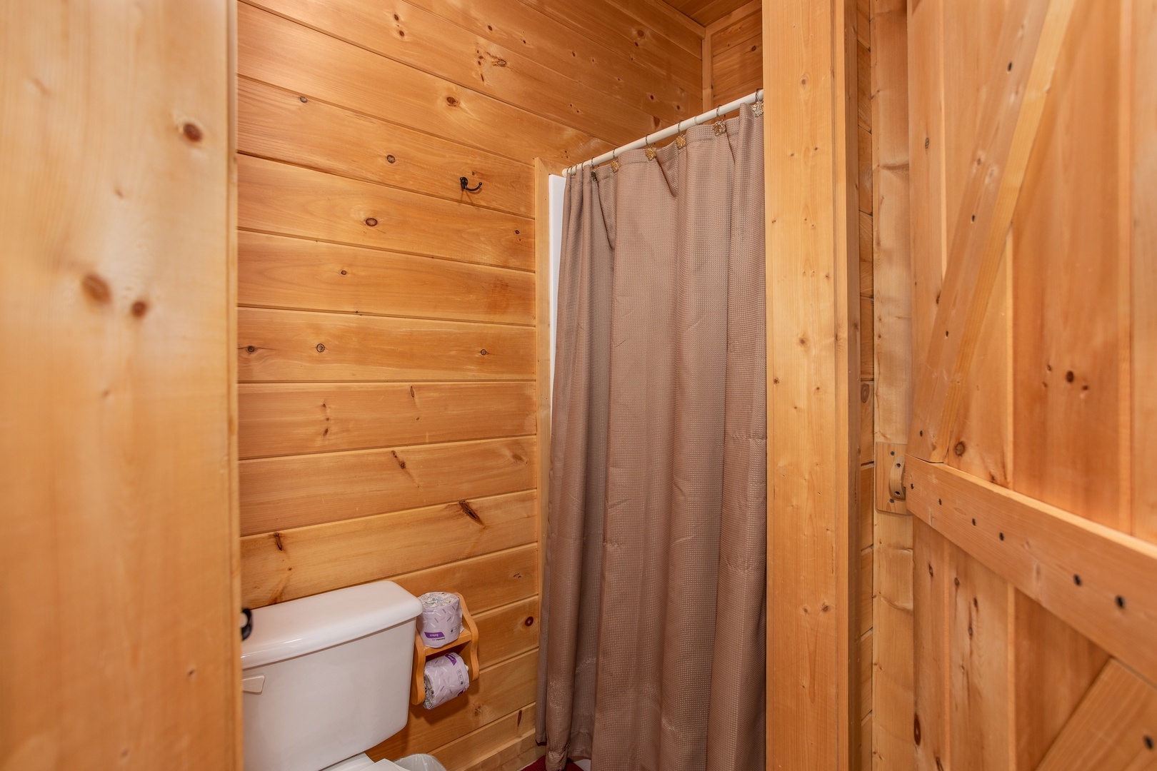 Second bathroom with a separate shower at Bearly in the Mountains, a 5-bedroom cabin rental located in Pigeon Forge