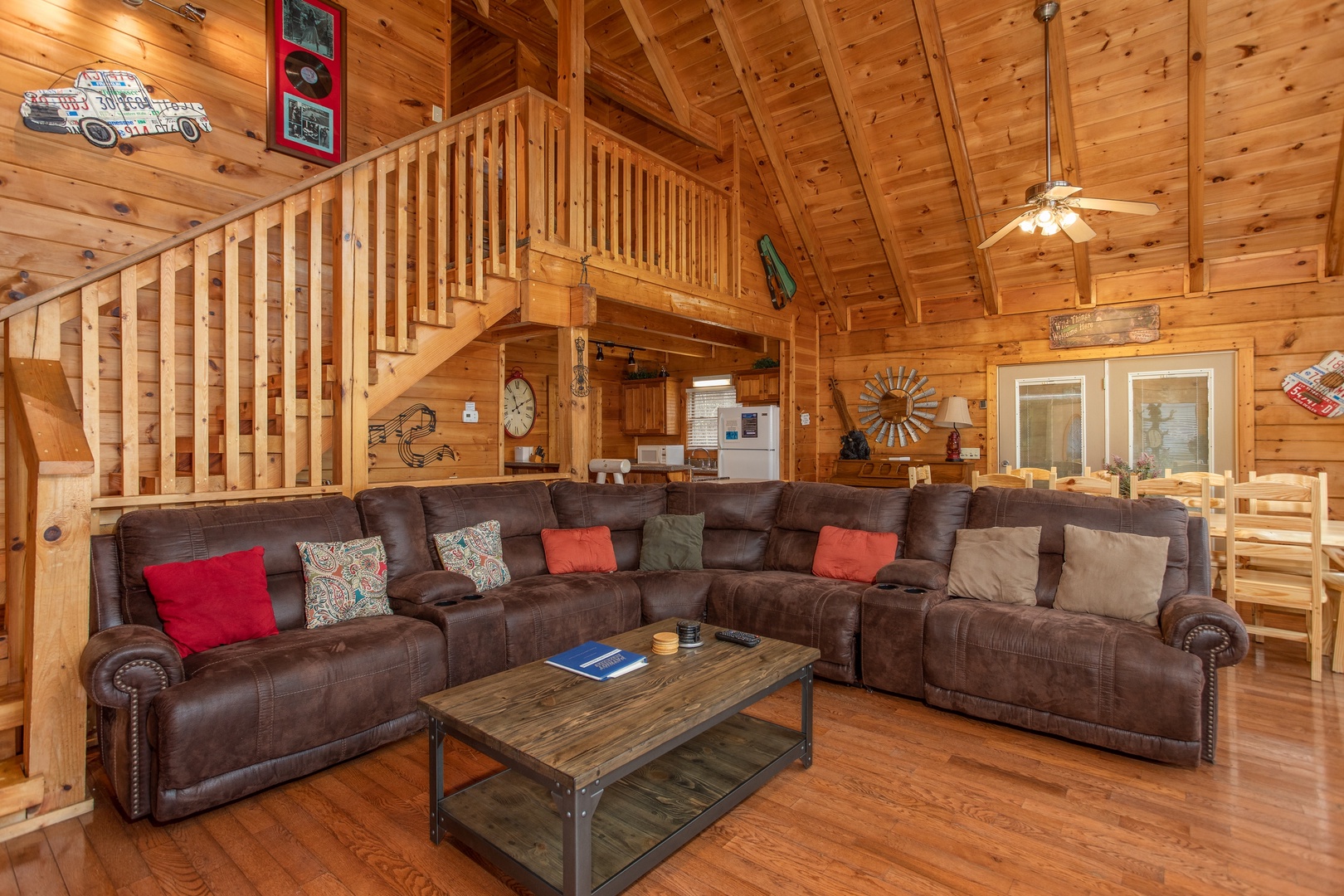 Sectional sofa in the living room at Mountain Music, a 5 bedroom cabin rental located in Pigeon Forge