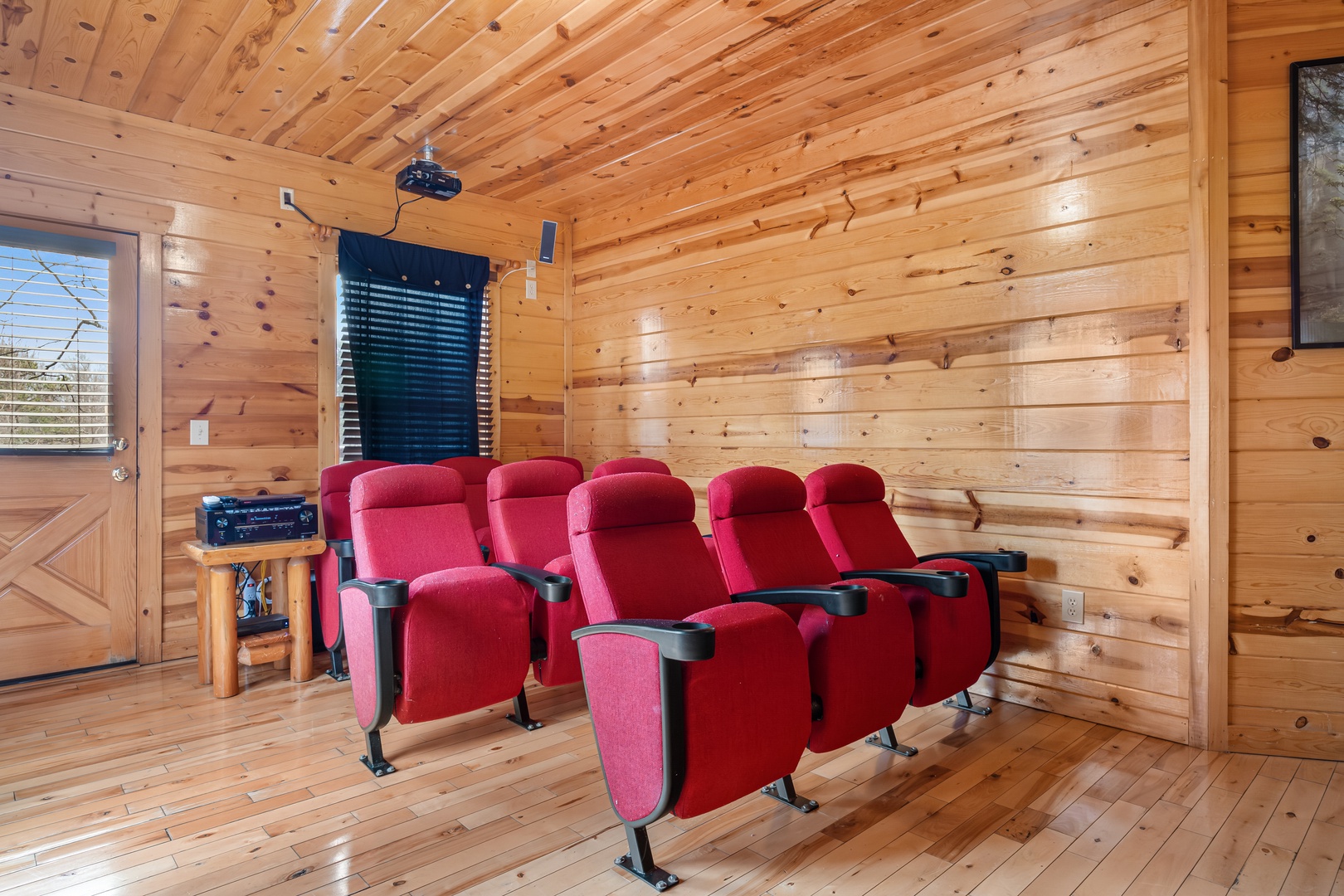 Theater room seats at Natural Wonder, a 4 bedroom cabin rental located in Gatlinburg