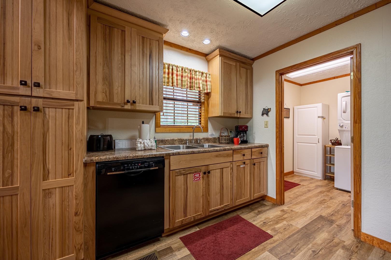 Kitchen and pantry at Cabin On The Hill, a 1 bedroom cabin rental located in Pigeon Forge