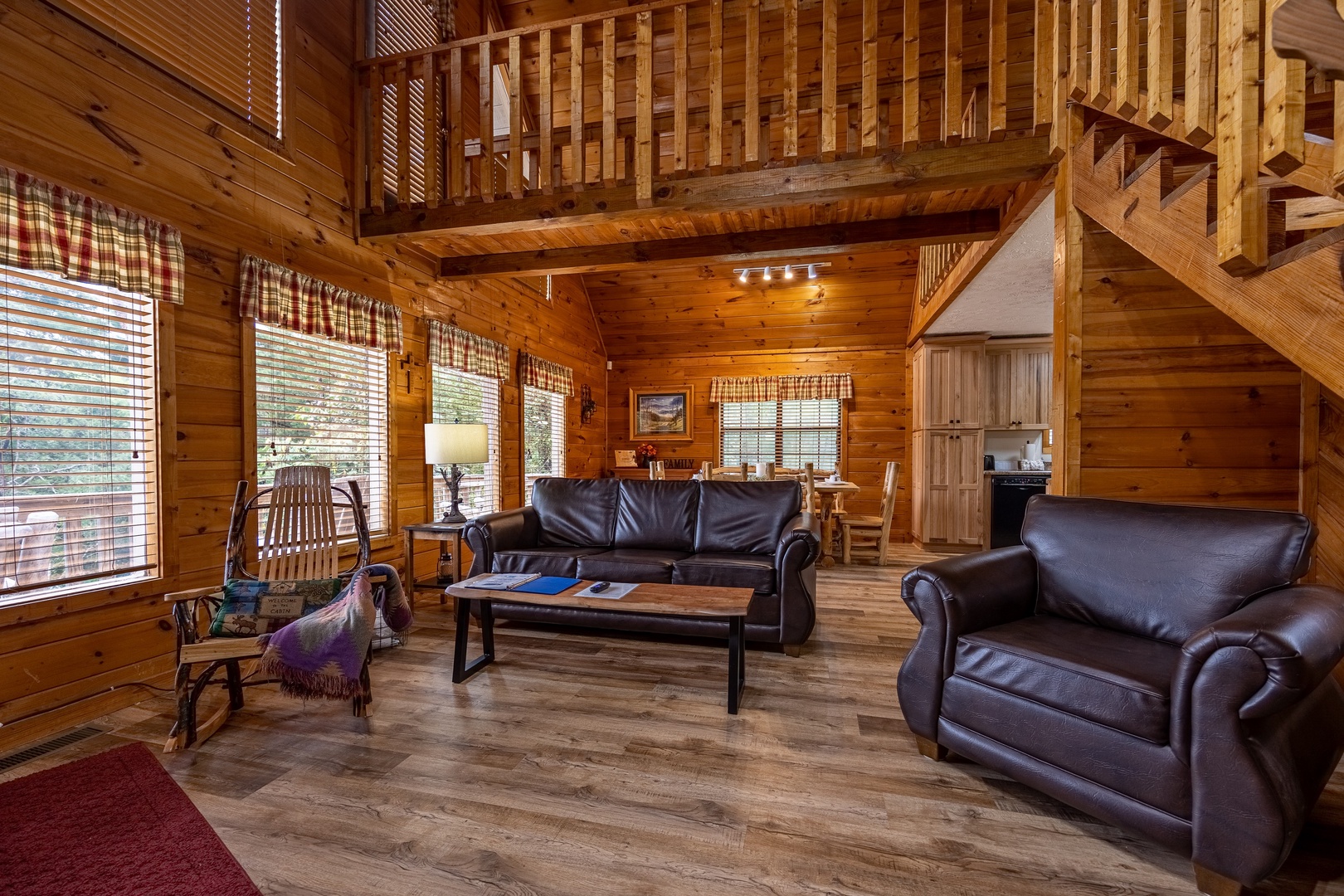 Livingroom seating at Cabin On The Hill, a 1 bedroom cabin rental located in Pigeon Forge