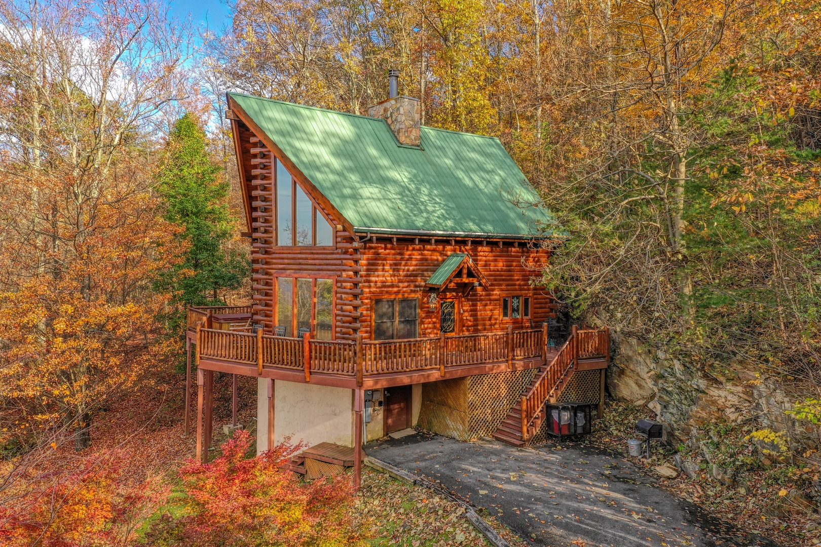 Side exterior view with parking at The Original American Dream, a 2 bedroom cabin rental located in Gatlinburg