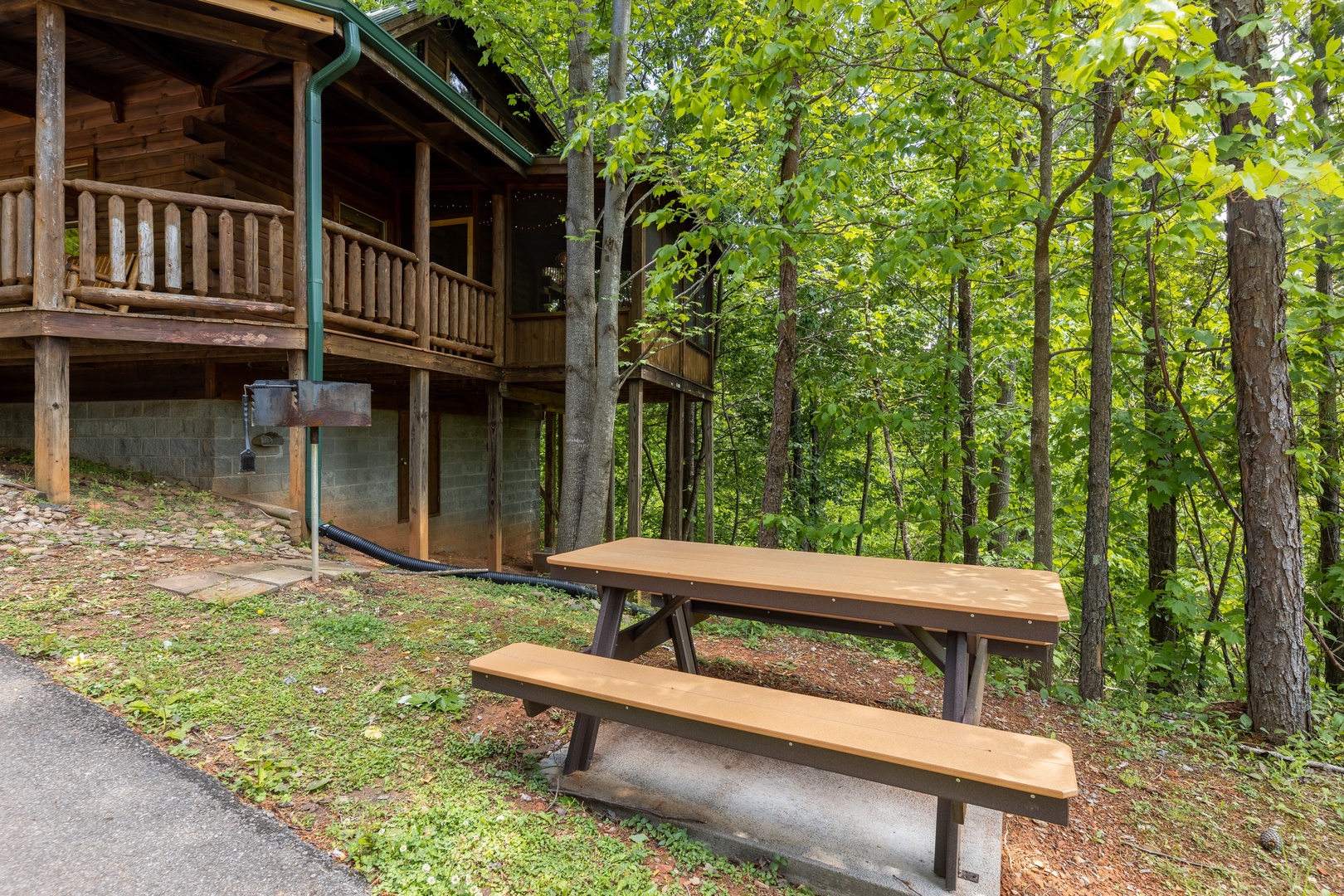 Picnic table at Moonlit Pines, a 2 bedroom cabin rental located in Pigeon Forge