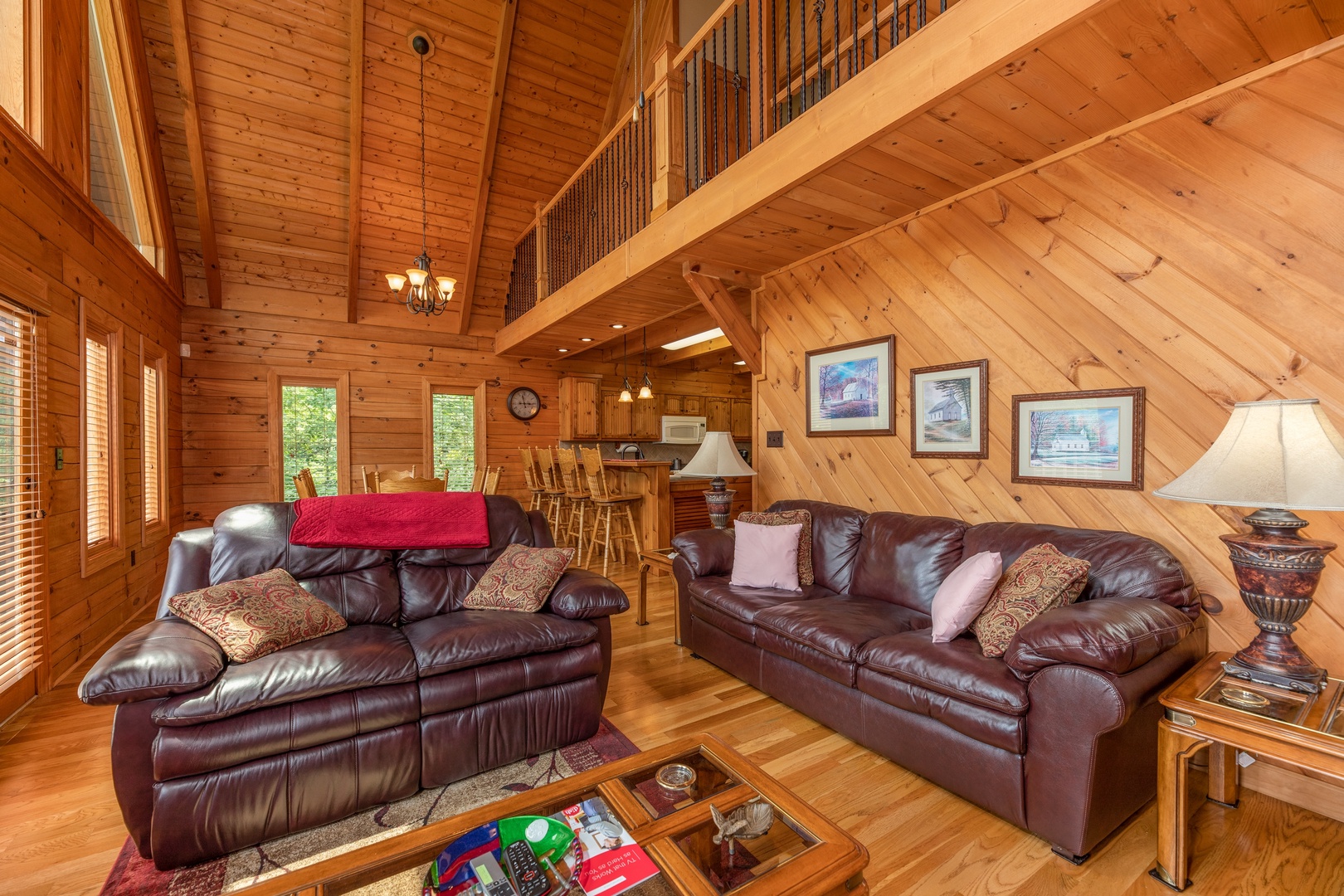 Sofa and loveseat in the living room at Mountain Lake Getaway, a 3 bedroom cabin rental located at Douglas Lake