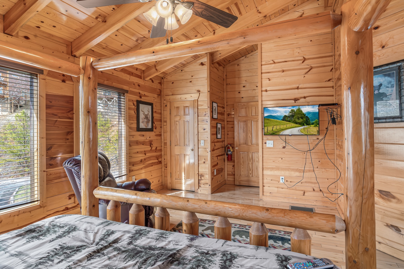 Second bedroom flat screen at Natural Wonder, a 4 bedroom cabin rental located in Gatlinburg
