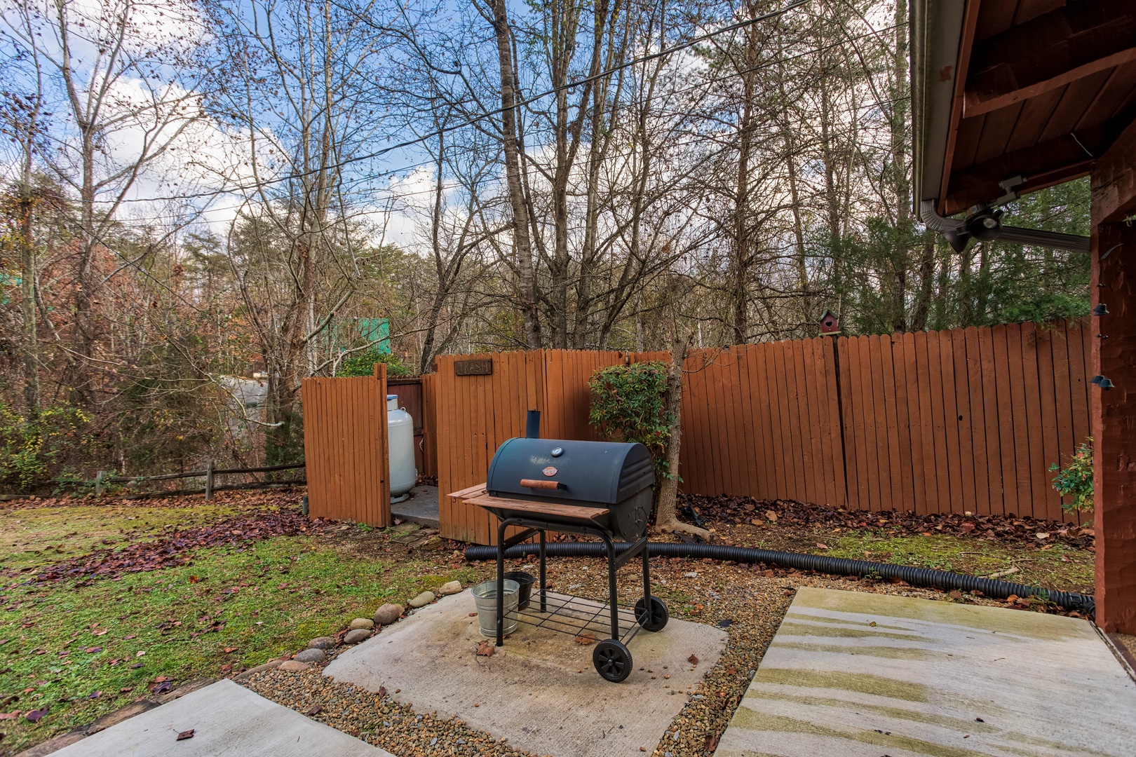 Grill on the patio at Rustic Ranch, a 2 bedroom cabin rental located in Pigeon Forge