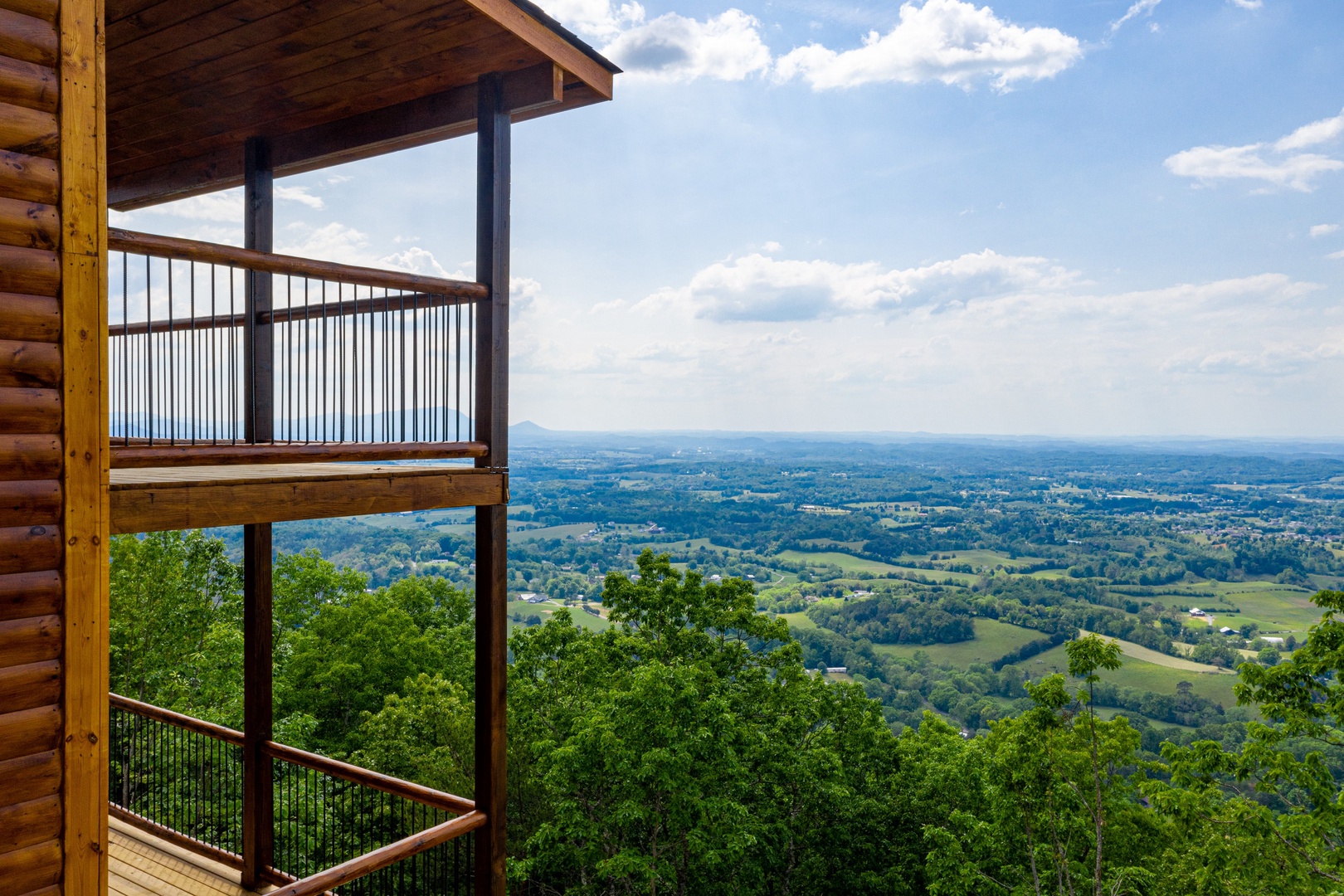 Deck and view at 4 States View, a 2 bedroom cabin rental located in Pigeon Forge