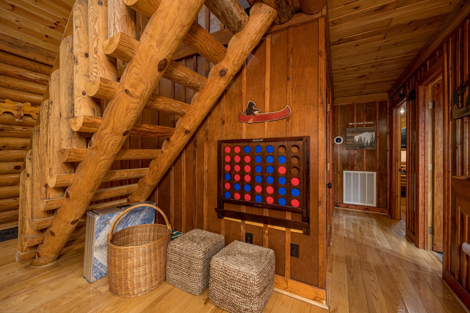 Stairs and Connect 4 Game at Moonlit Mountain Lodge