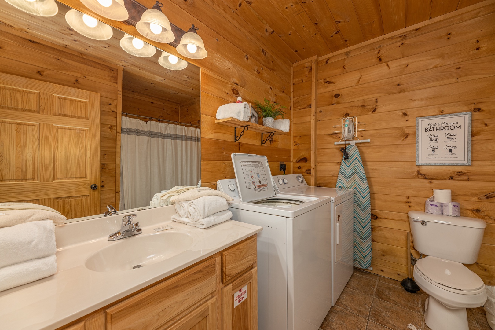 Downstairs bathroom at Happy Hideaway, a 4 bedroom cabin rental located in Pigeon Forge