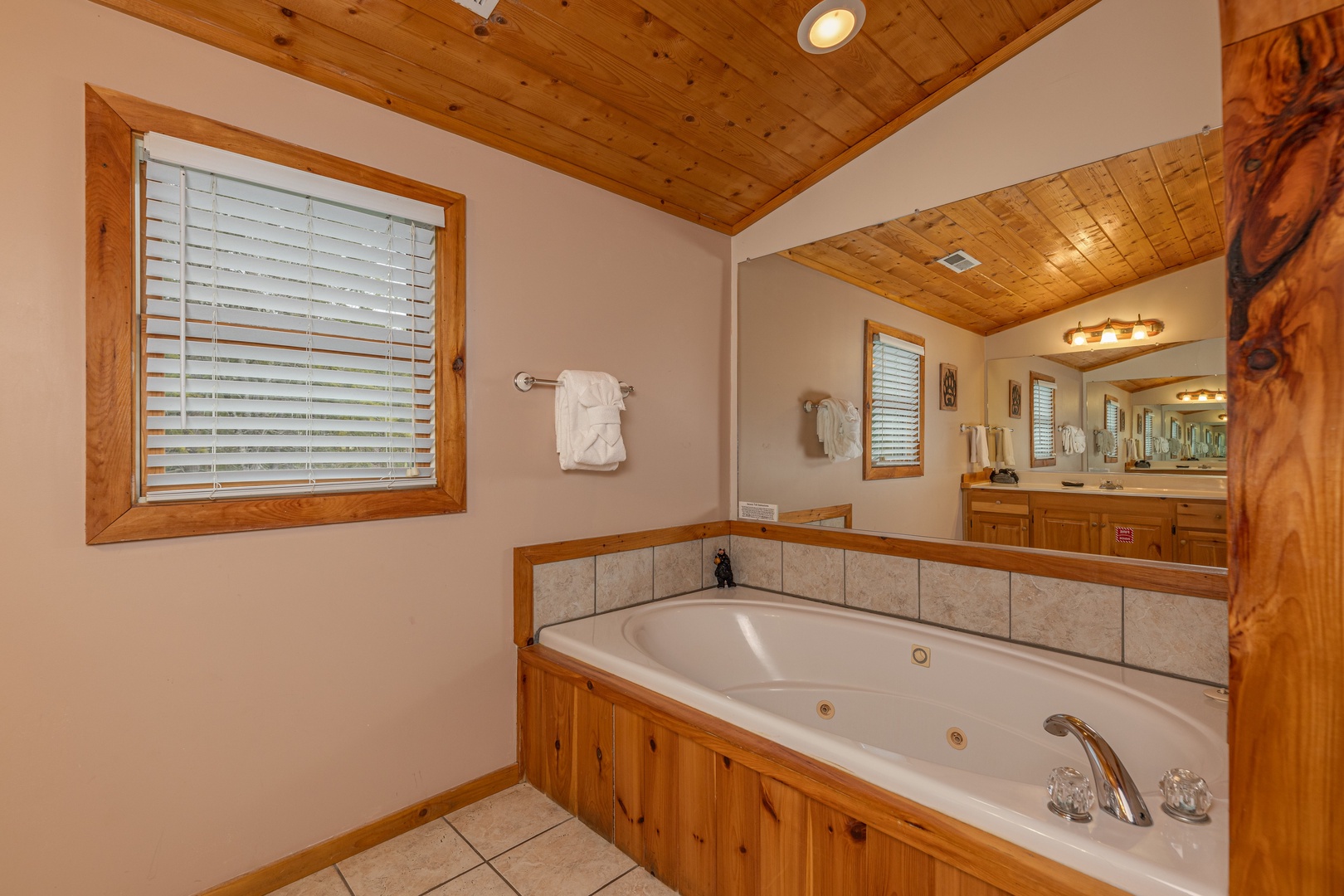 Jacuzzi in a bathroom at Almost Bearadise, a 4 bedroom cabin rental located in Pigeon Forge