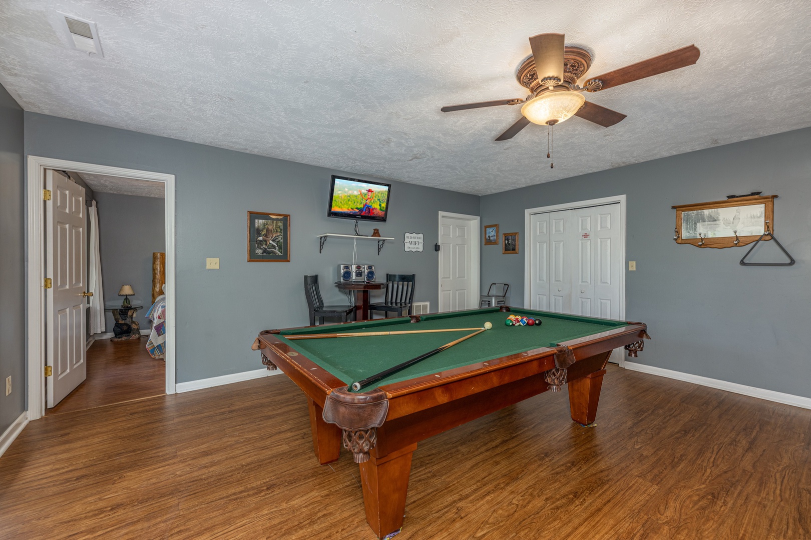 Pool table in a game room at Wildlife Retreat, a 3 bedroom cabin rental located in Pigeon Forge