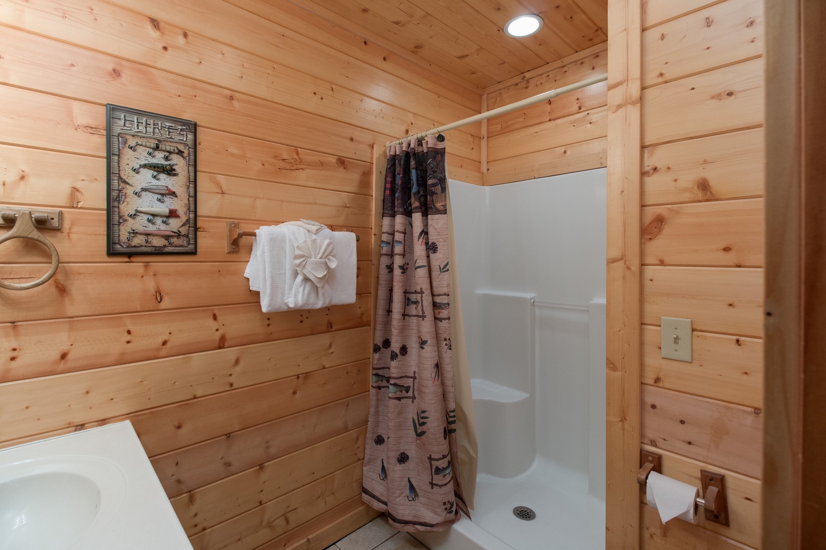 Shower at Family Ties Lodge, a 4 bedroom cabin rental located in pigeon forge