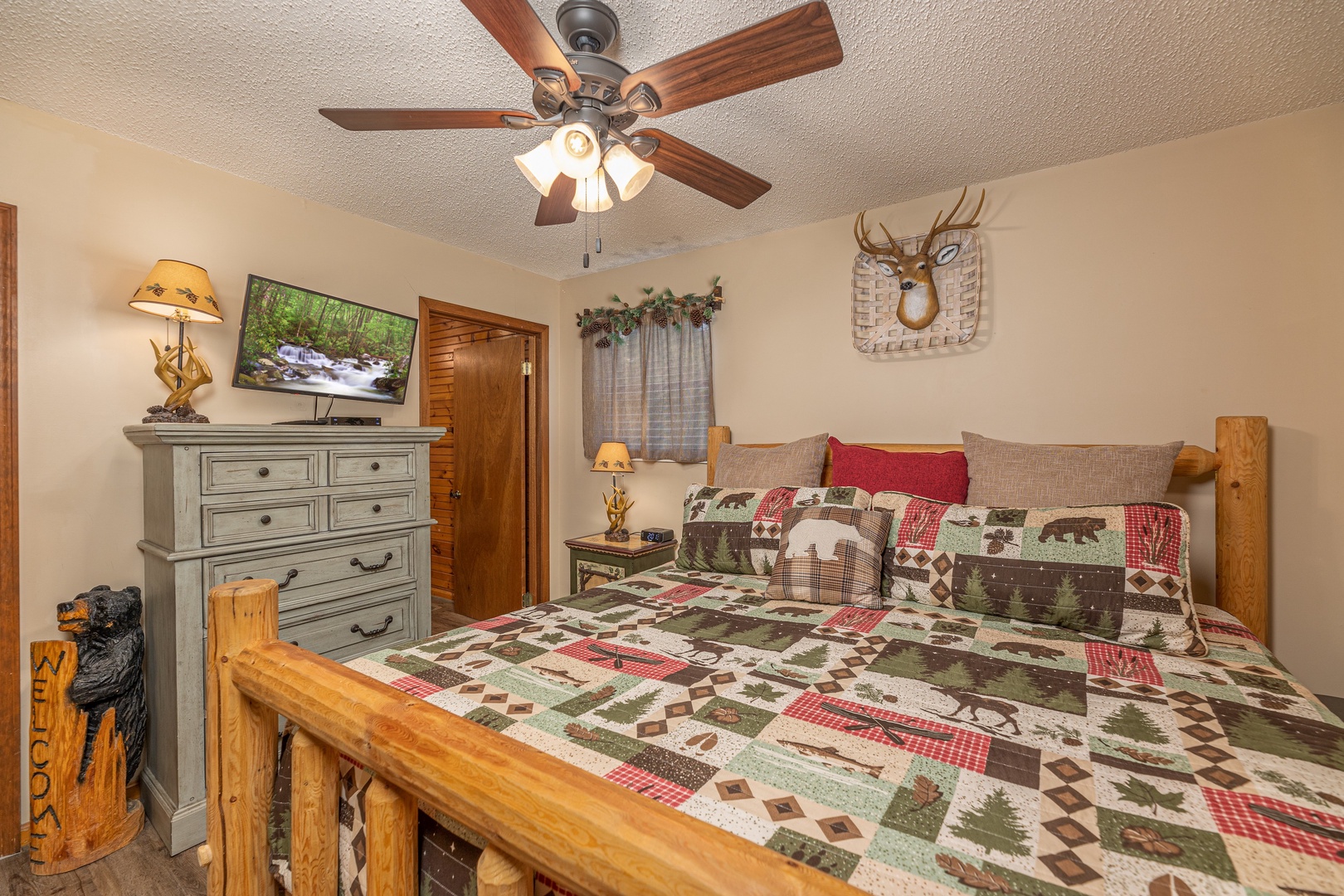 Bedroom with amenities at Magic Moments, a 2 bedroom cabin rental located in Pigeon Forge