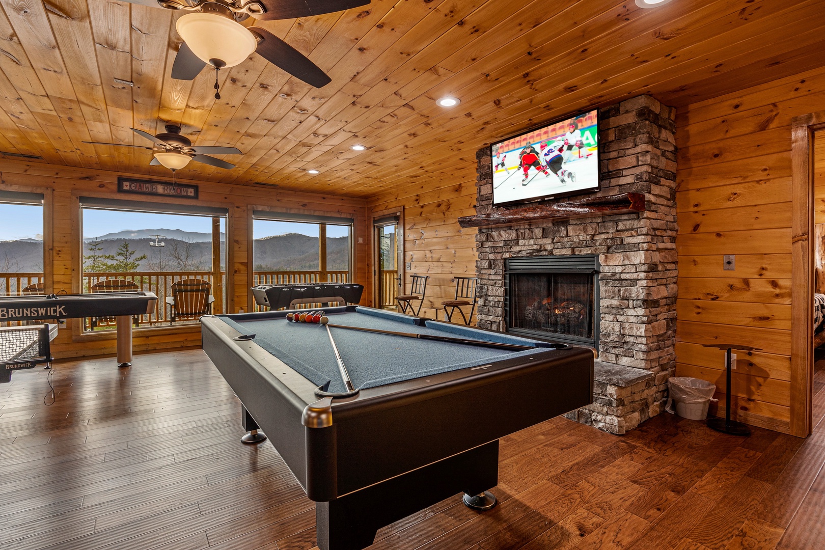 Pool table at Four Seasons Grand, a 5 bedroom cabin rental located in Pigeon Forge