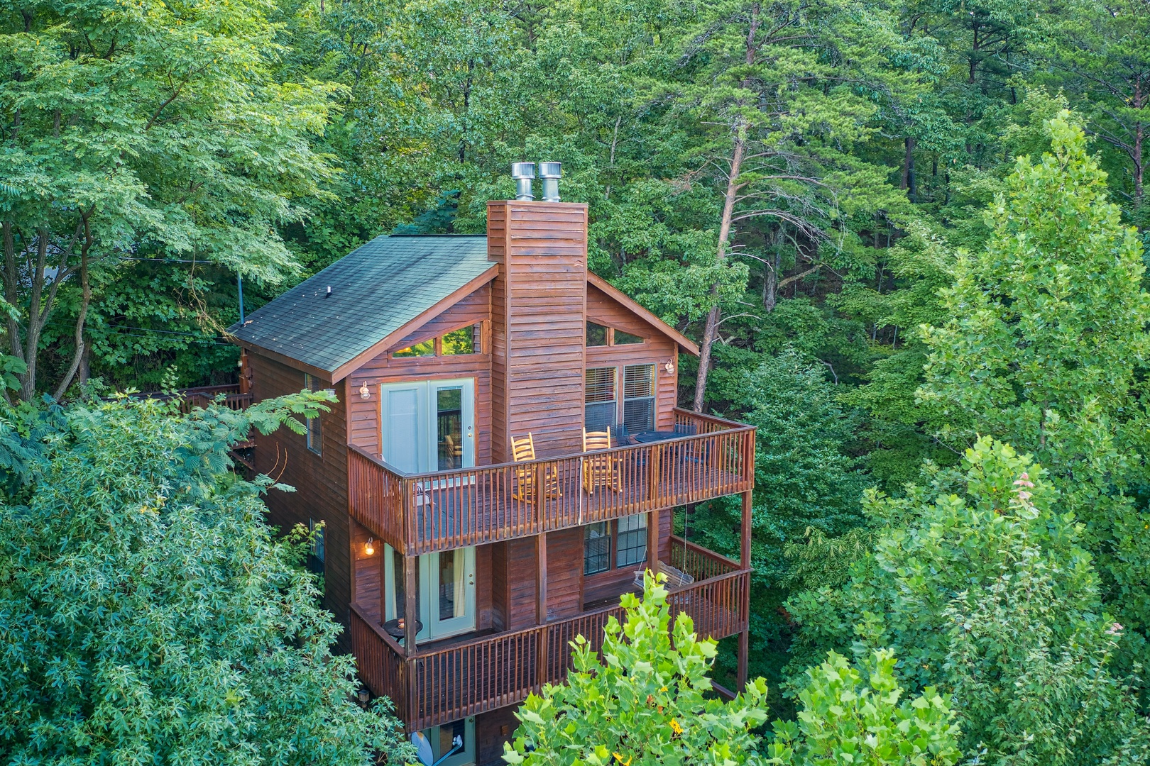 A cabin with two decks at A View for You, a 1 bedroom cabin rental located in Pigeon Forge