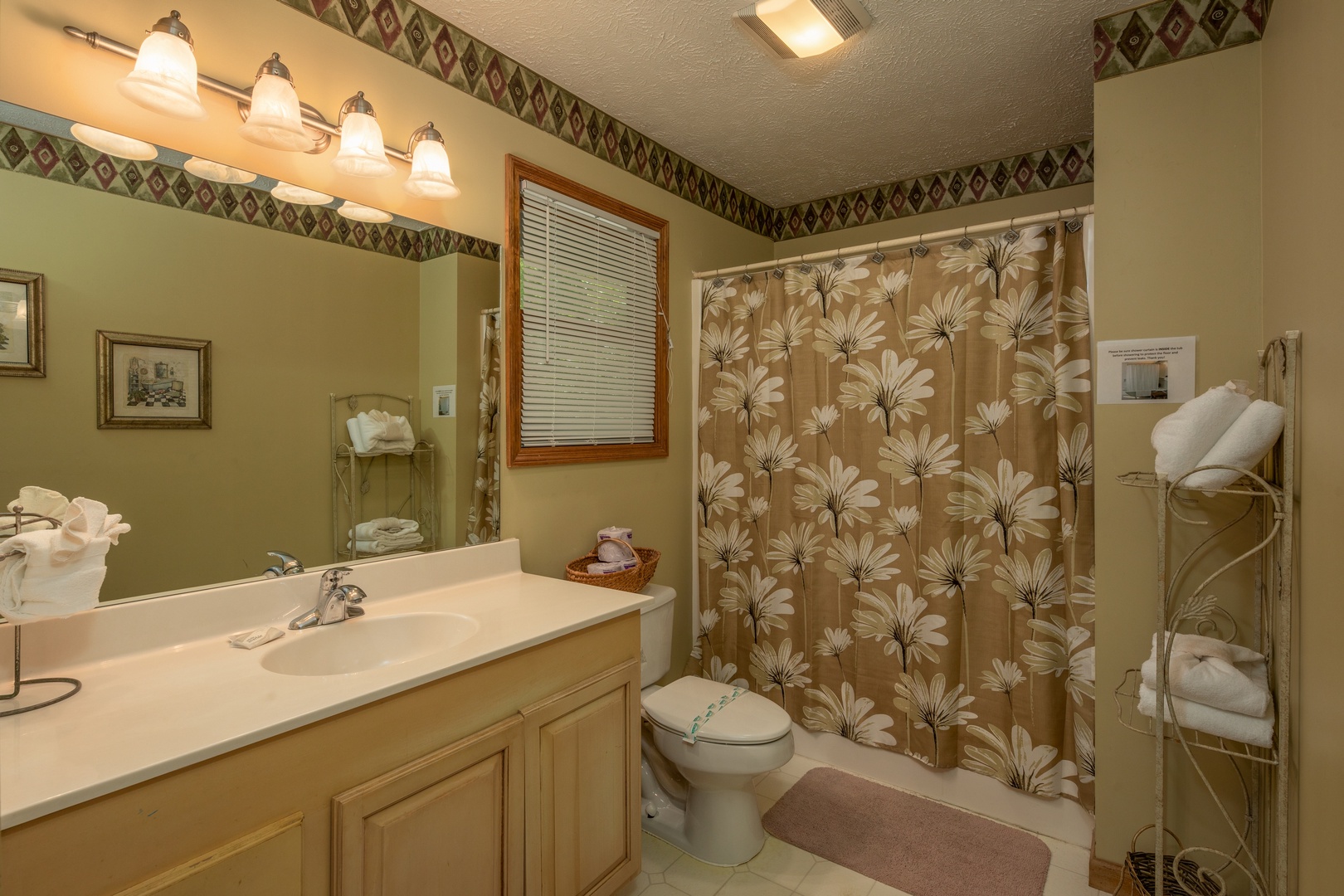 Bathroom with a tub and shower at Amazing Memories, a 3 bedroom cabin rental located in Pigeon Forge