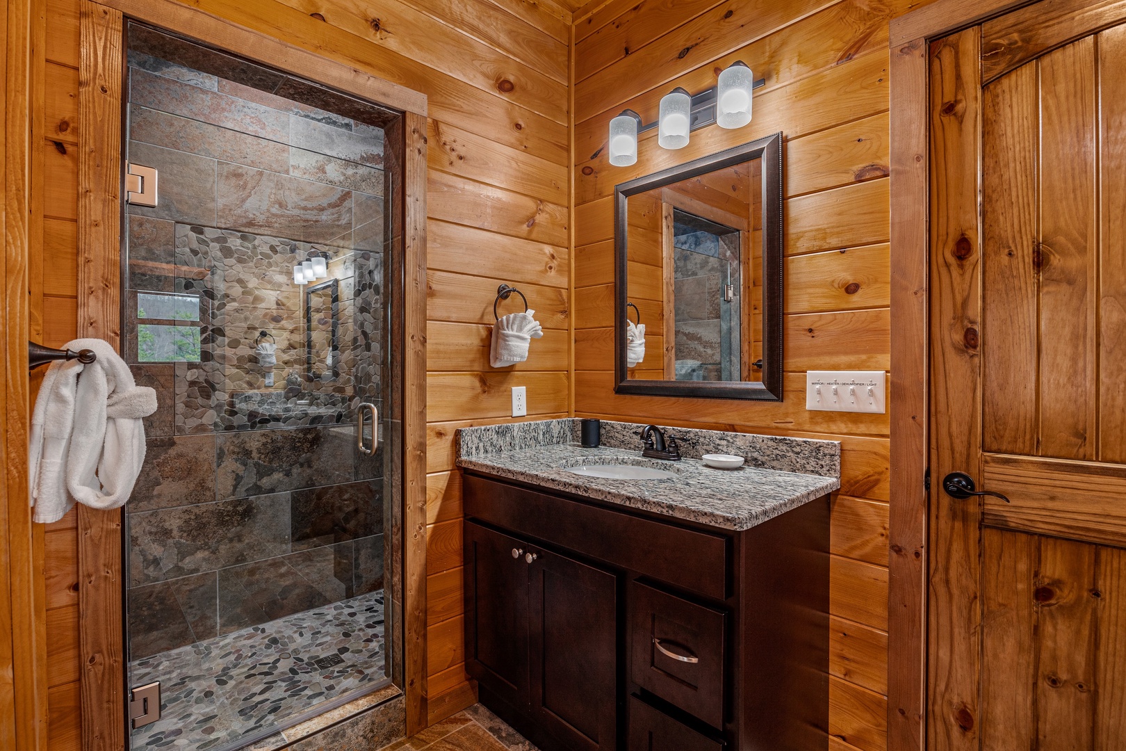 Master bathroom with shower at Four Seasons Grand, a 5 bedroom cabin rental located in Pigeon Forge