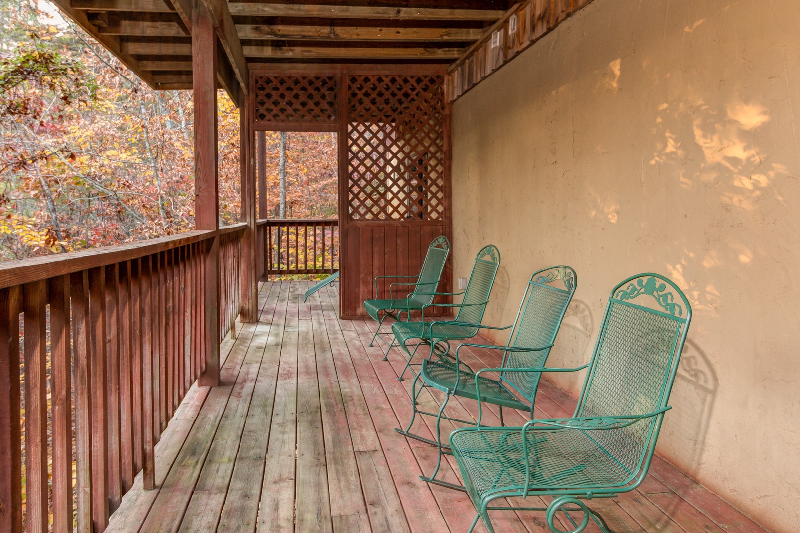 Lower deck chairs at Just for Fun, a 4 bedroom cabin rental located in Pigeon Forge