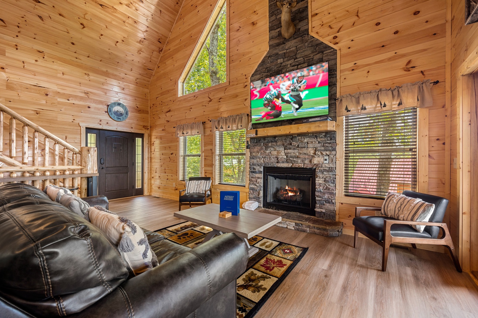 Livingroom with Flat Screen TV and Fireplace at Mountain Top Views