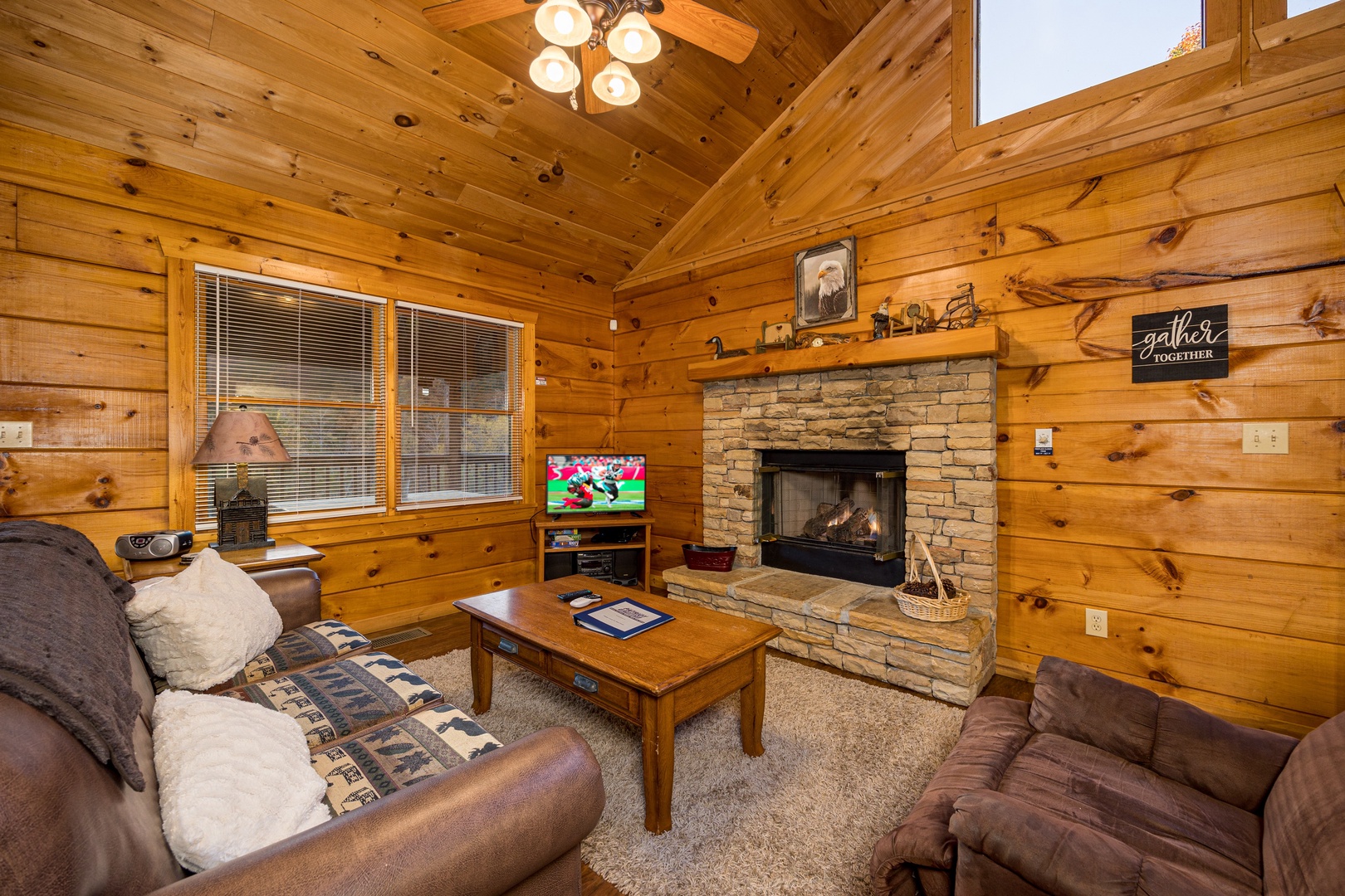 Livingroom fireplace at Eagle's Loft, a 2 bedroom cabin rental located in Pigeon Forge